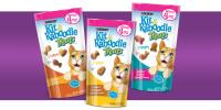 Kit & Kaboodle cat treats bags on a purple background.