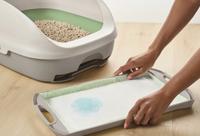 person changing a breeze pad