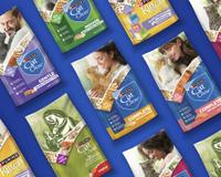A tilted collage of Purina Cat Chow bags