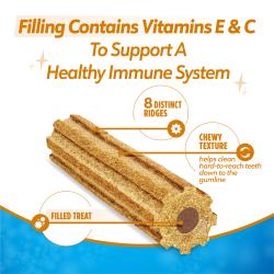 El relleno contiene vitaminas E y C que ayudan a apoyar un sistema inmunitario saludable. Un bocadillo relleno, con ocho surcos distintos y una textura masticable que ayuda a limpiar los dientes difíciles de alcanzar hasta la línea de las encías.