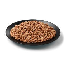 Purina Pro Plan Complete Essentials beef and rice wet dog food in a dish
