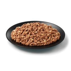 Purina Pro Plan Complete Essentials beef and rice wet dog food in a dish