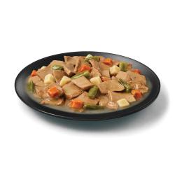 Purina Pro Plan Complete Essentials chicken and vegetables wet dog food in a dish