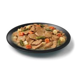 Purina Pro Plan Complete Essentials lamb and vegetables wet dog food in a dish