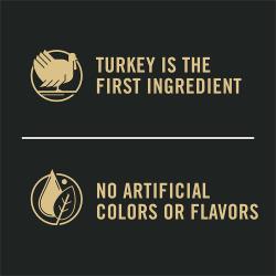 Etiqueta del paquete de alimento para perros que resalta “El pavo es el primer ingrediente” y “Sin sabores artificiales”