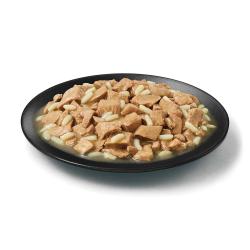 Purina Pro Plan Complete Essentials adult 7 plus beef and rice senior wet dog food in a dish