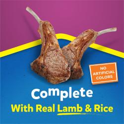 Puppy Chow Complete dry food package label highlighting made with real lamb and rice, no artificial colors