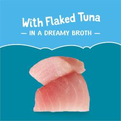 Flaked tuna image with text; "With flaked tuna in a dreamy broth"