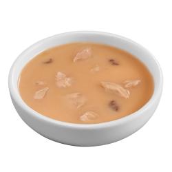 Friskies Bits n Broth tuna flavored cat food topper in bowl