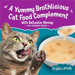 Cat licking paw with text: "A Yummy Brothlicious Cat Food Complement. With saltwater shrimp in a dreamy broth."