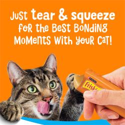 Just tear and squeeze Friskies lil Lickables cat treats to start bonding moments with your cat.