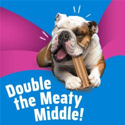 A bulldog enjoying Busy Stuf’d Beef Filled Dog Treats, with text saying Double the Meaty Middle!