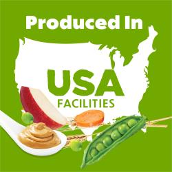 Peanut butter, apples, carrots, peas and wheat surround a US map outline with text: Produced In USA Facilities.