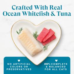 Fancy Feast Grilled Ocean Whitefish and Tuna Feast wet cat food with real fish on a heart plate; complete and balanced.