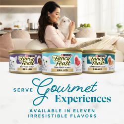 Fancy Feast Grilled Ocean Whitefish and Tuna Feast wet cat food cans with woman and white cat; eleven irresistible flavors.