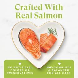 Fancy Feast Grilled Salmon Feast wet cat food with real salmon on a heart plate; no artificial colors or preservatives.