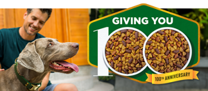 Man petting dog. Giving You 100.