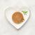 Fancy Feast Kitten Paté wet kitten food plated on a heart-shaped dish