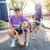 Woman at finish line with dog