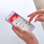 Close-up of hands using a smartphone to browse products in a mobile app