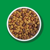 A top down image of Purina Dog Chow dry food in a bowl sitting on a green background