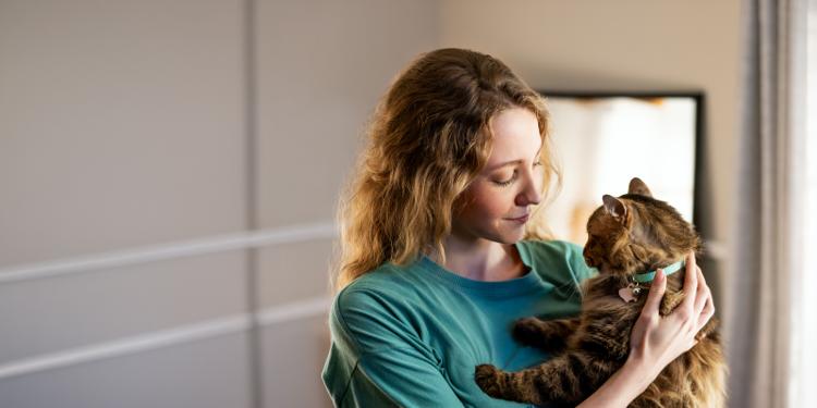 Woman holding cat