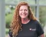 Deb in a black shirt with Purina logo