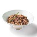 Marinated Morsels chicken in gravy plated