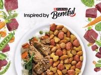 A bowl shows half filled with rice, vegetables and beef, with the other half showing Beneful dry kibble. Meat and vegetables boarder the bowl on a white background. Text read "Inspired by Purina Beneful."