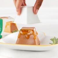person plating Fancy Feast Gems on to plate