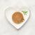 Fancy Feast Kitten Paté wet kitten food plated on a heart-shaped dish