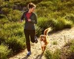 woman running with dog