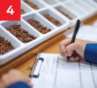 person filling out form while inspecting ingredients