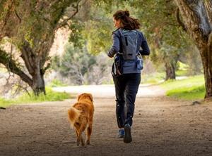 woman running with dog
