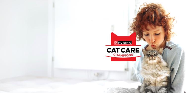 woman with cat on a couch