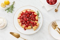 A strawberry pie on a plate