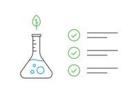 A test tube with a leaf and check marks