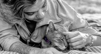 Woman petting a cat