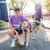 Woman at finish line with dog
