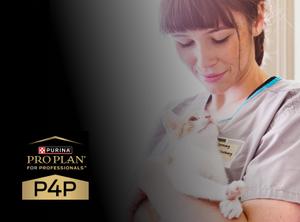 A woman holding a cat