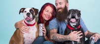 Urban Chestnut family holding urban underdog beers and dogs