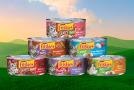 Friskies wet cat food on illustrated background of grassy hills