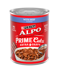 Red can of Purina ALPO Prime Cuts Wet Dog Food With Beef in Gravy