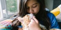 A cat with a girl