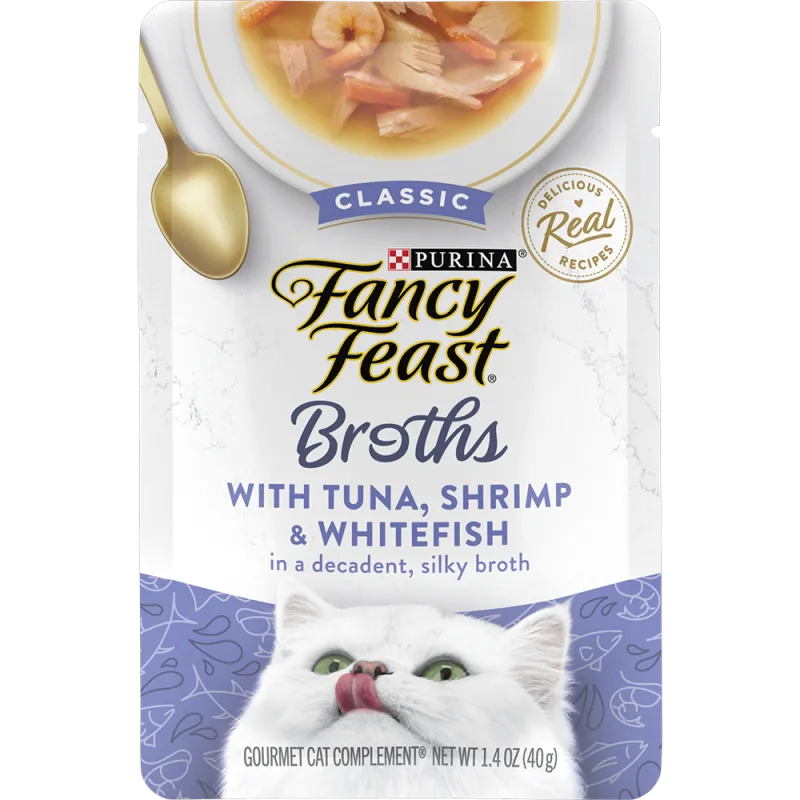 Complemento de alimento húmedo para gatos con atún, camarones y pescado blanco en un delicioso y sedoso caldo de Fancy Feast